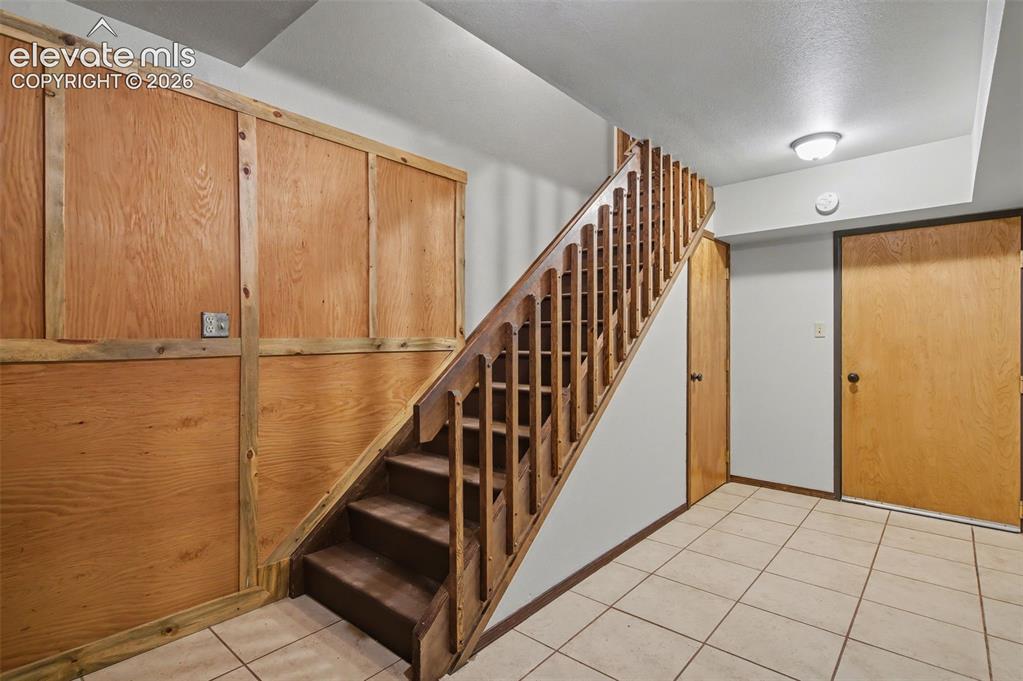 Image 45 of 50: Basement/garage entry area