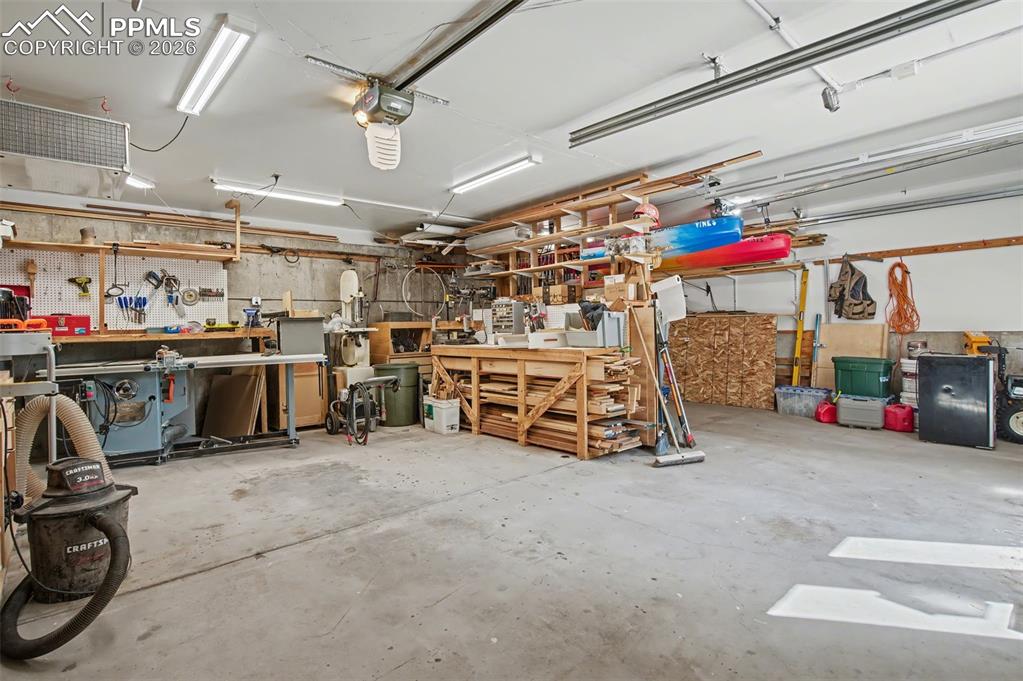 Image 47 of 50: Garage/workshop area