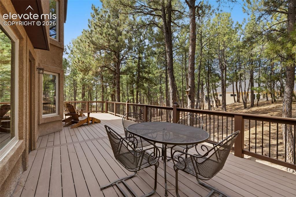 Image 7 of 50: Large wrap-around composite deck