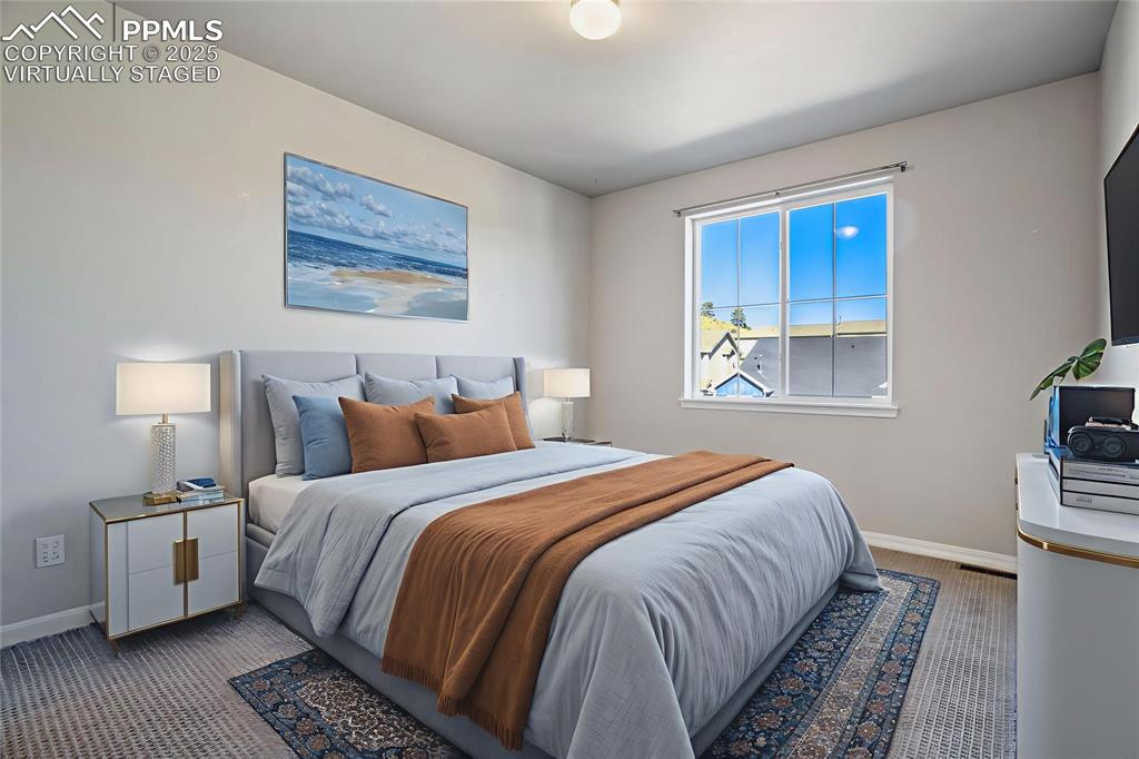 Image 20 of 44: Bedroom with carpet floors,virtually staged