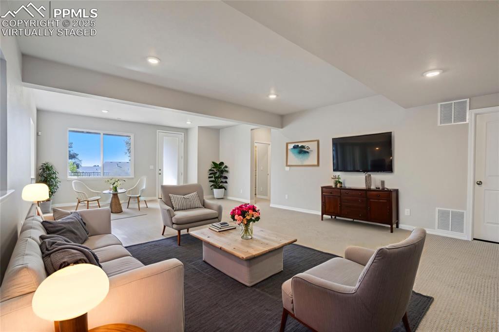 Image 27 of 44: Living room featuring carpet flooring and recessed lighting,virtually stage