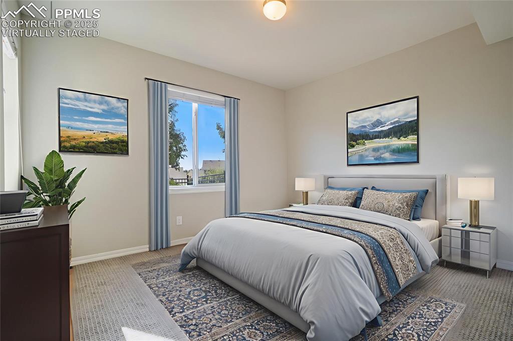 Image 30 of 44: Carpeted bedroom with baseboards, virtually staged