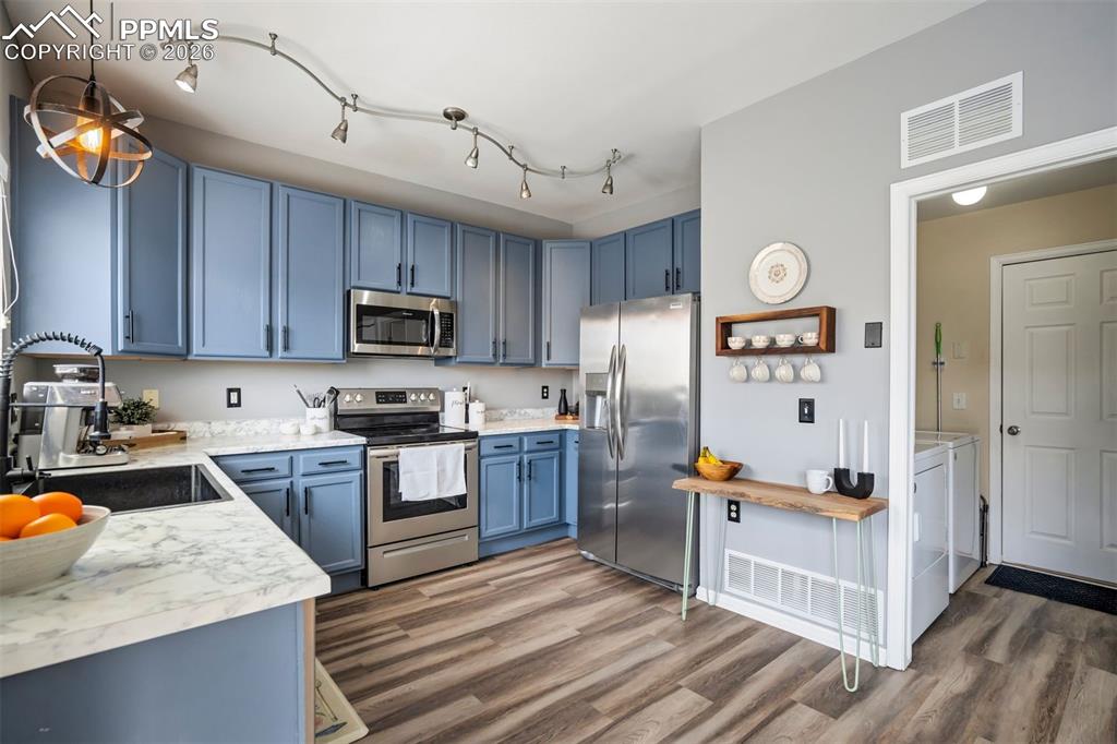 Image 11 of 42: Where morning coffee & late-night snacks are equally enjoyed. 