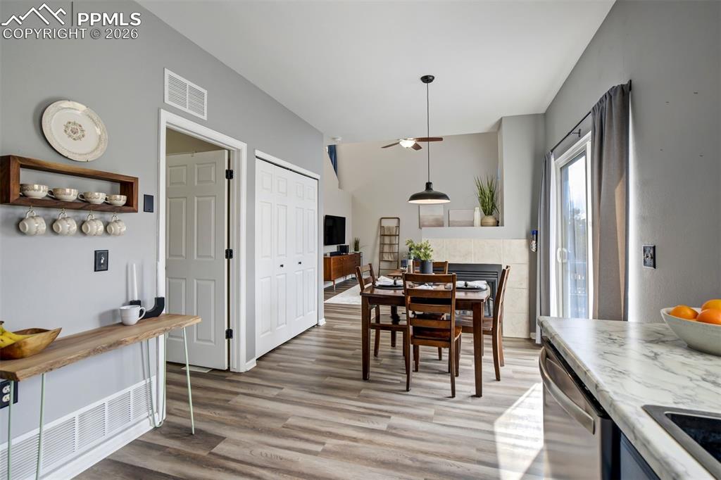 Image 12 of 42: Kitchen is open to the dining area. 