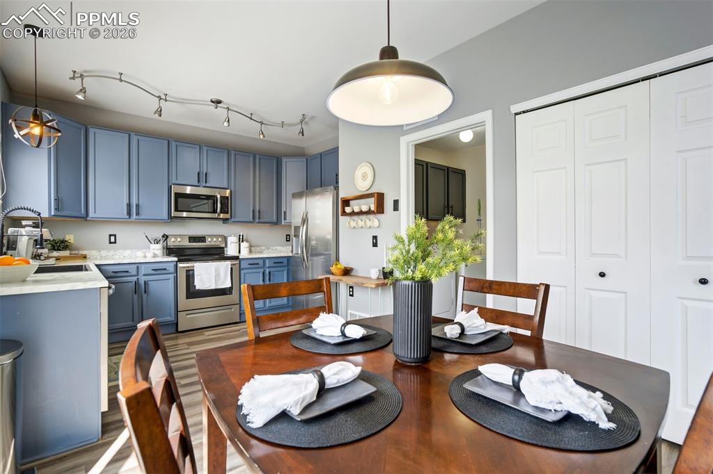 Image 15 of 42: Dining area and a pantry. Yes, please. 