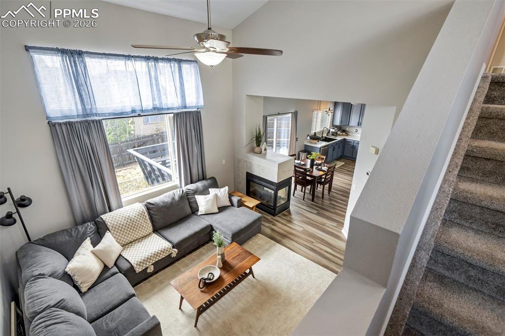 Image 22 of 42: Open view overlooking the living room. 