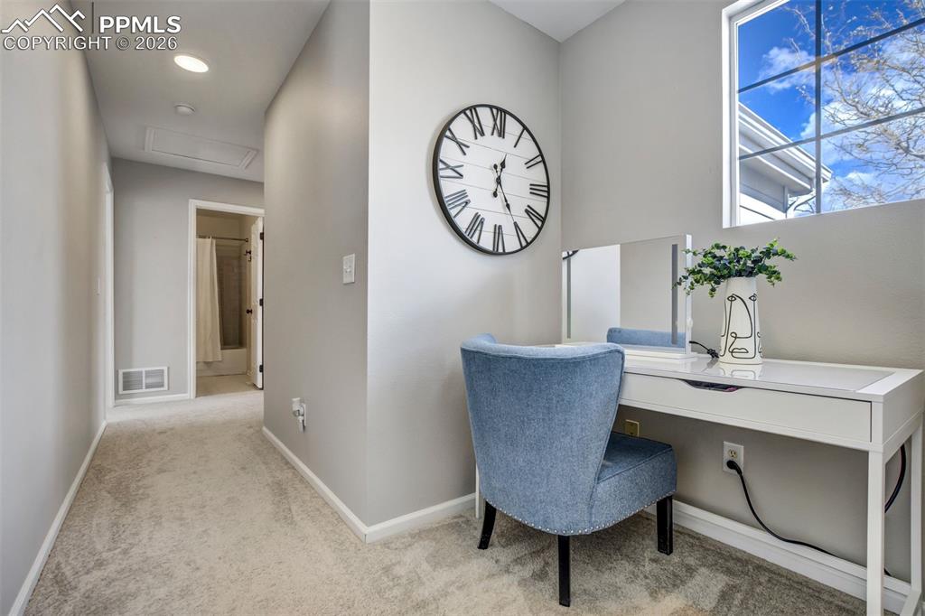 Image 23 of 42: Reading nook / office setup. 