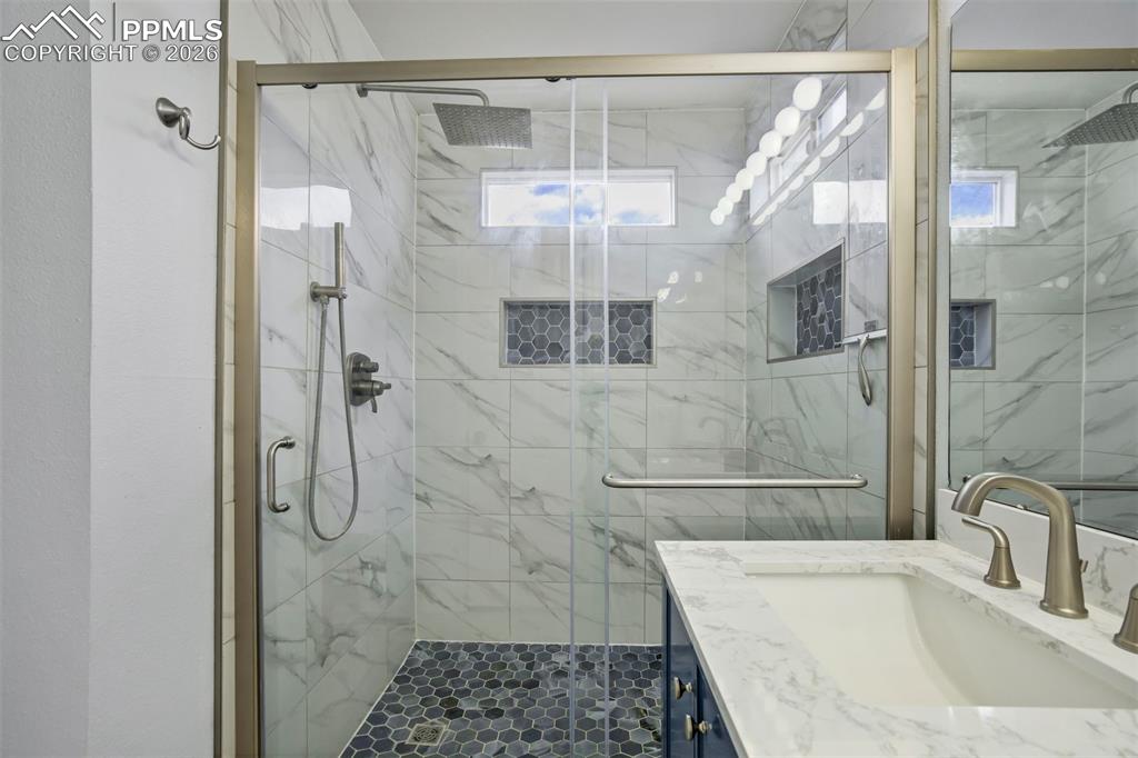 Image 29 of 42: This shower is a total spa experience. 
