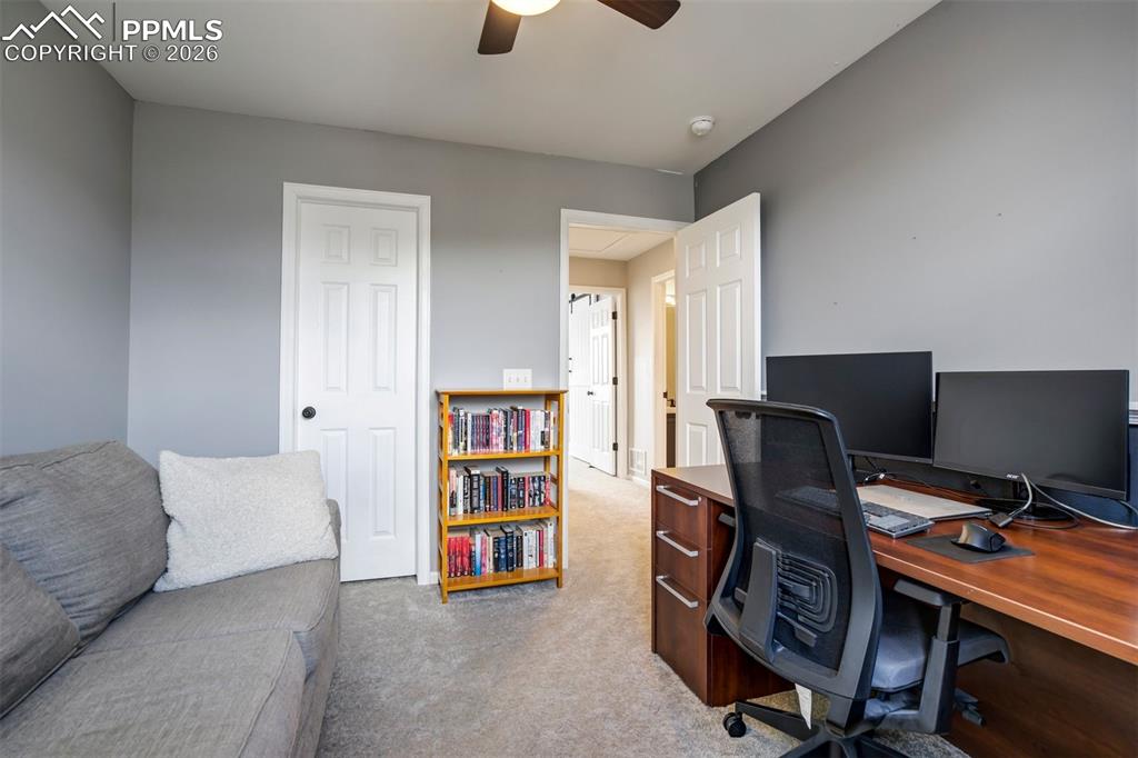 Image 35 of 42: Third bedroom currently being used as an office. 
