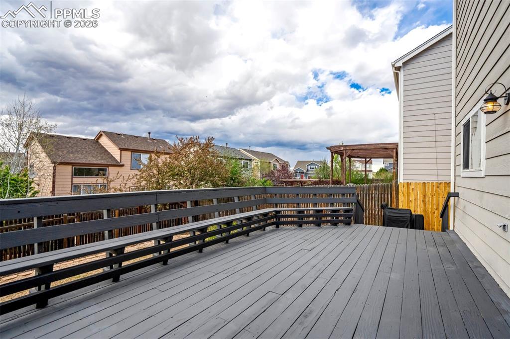 Image 38 of 42: Big yard energy: cornhole tournaments highly encouraged.