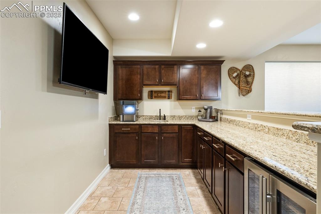 Image 26 of 37: Basement wet bar