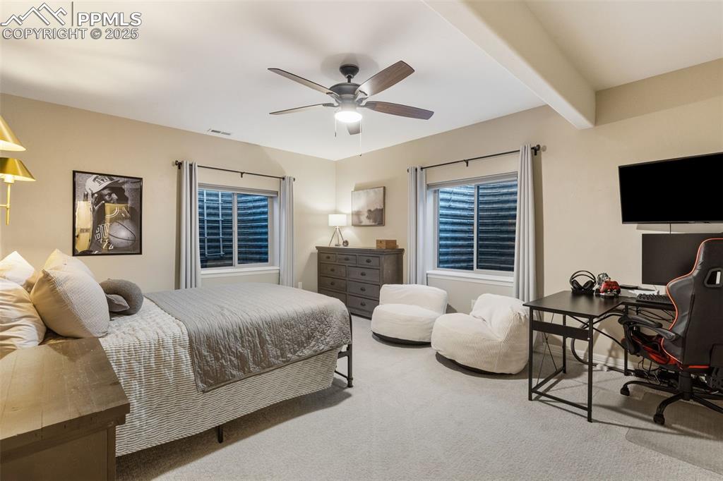 Image 30 of 37: Large basement bedroom with ensuite