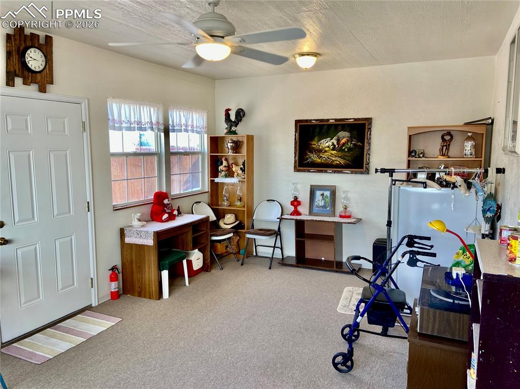 Image 19 of 38: Enclosed Patio