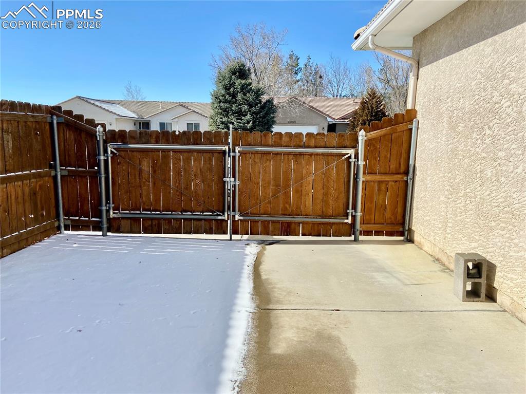 Image 35 of 38: Gate for access to RV parking