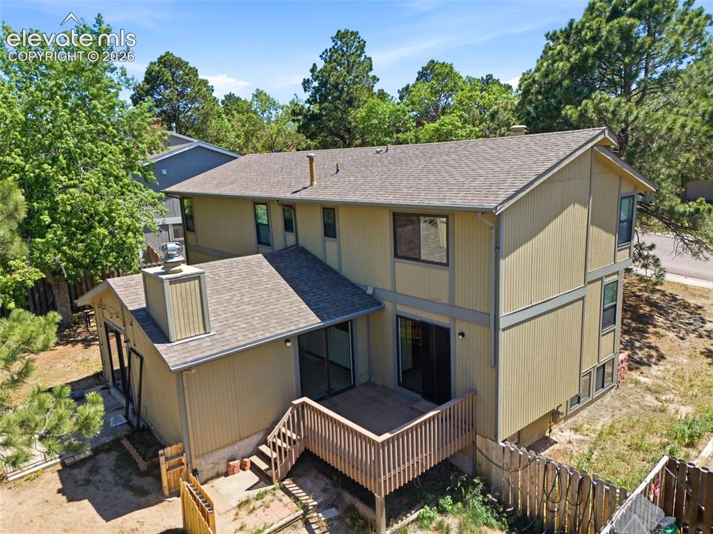 Image 50 of 50: Exterior featuring a multi-level design, wood siding, and a gabled roof