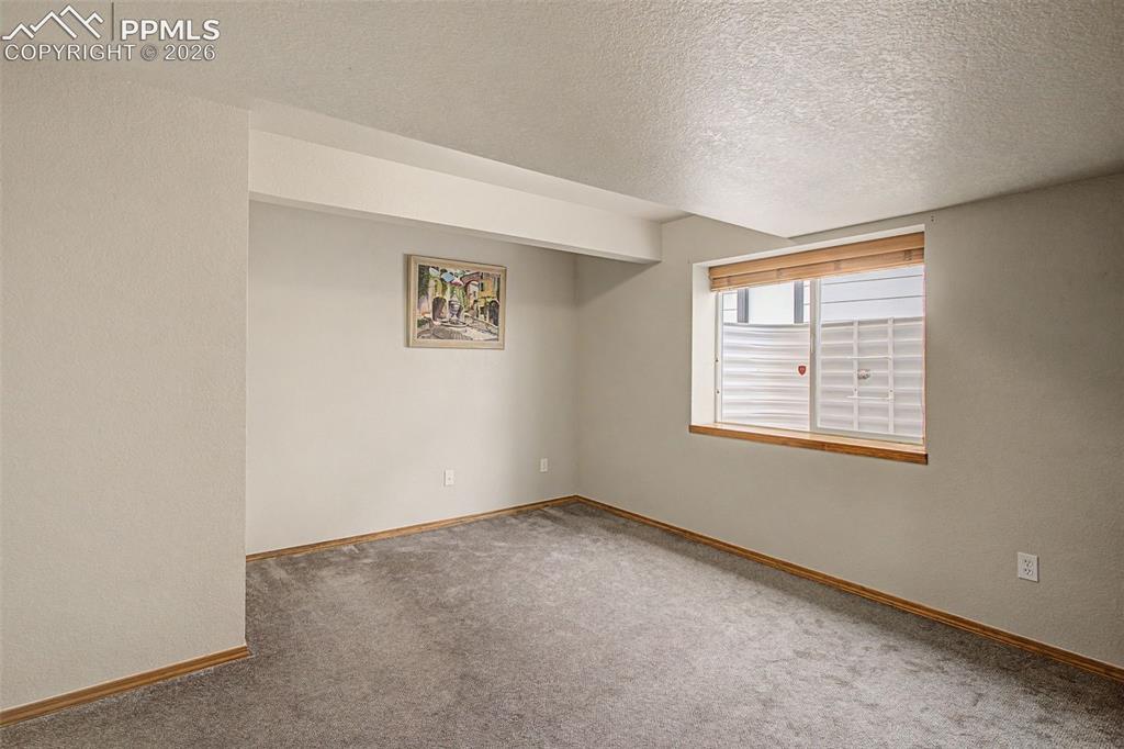 Image 34 of 46: Third basement bedroom