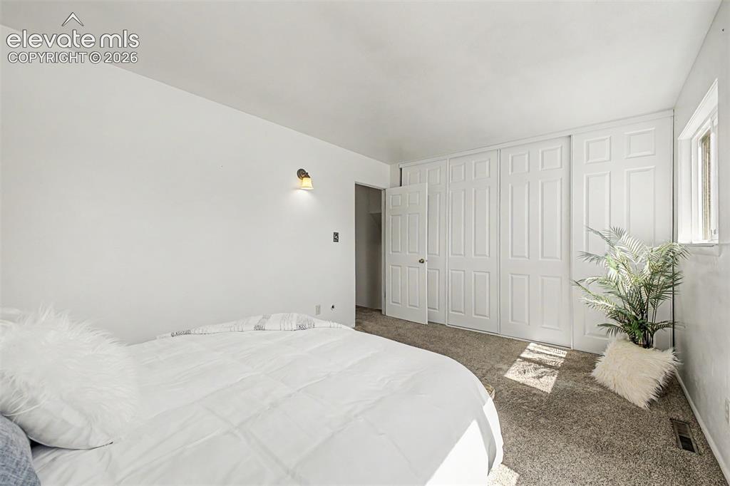 Image 10 of 37: Oversized closet offers room for all your clothing