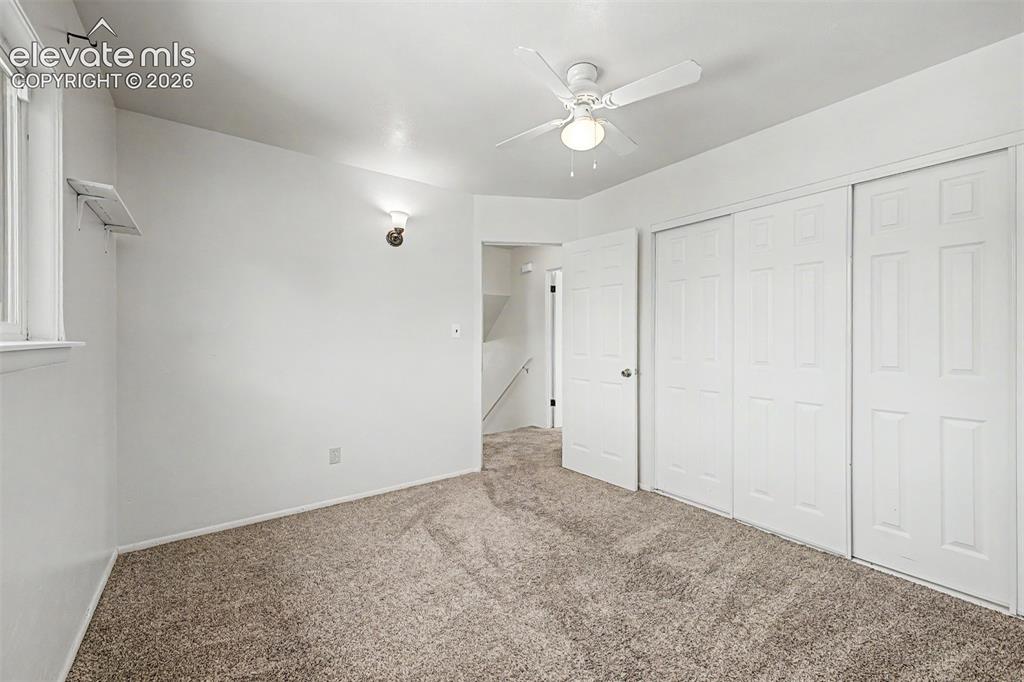 Image 12 of 37: Extra closet space in guest bedroom