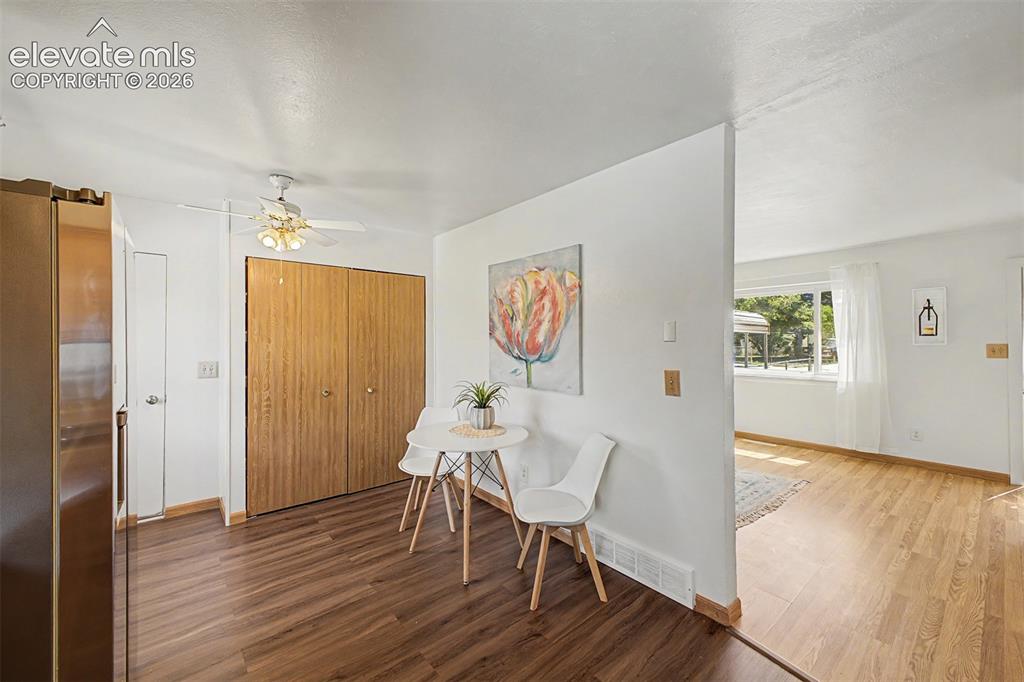 Image 7 of 37: Eat-in kitchen. a large pantry and side door to the back yard.