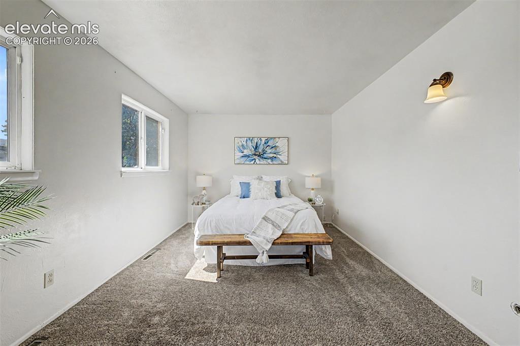 Image 9 of 37: Recessed windows with natural light offers a peaceful sleep