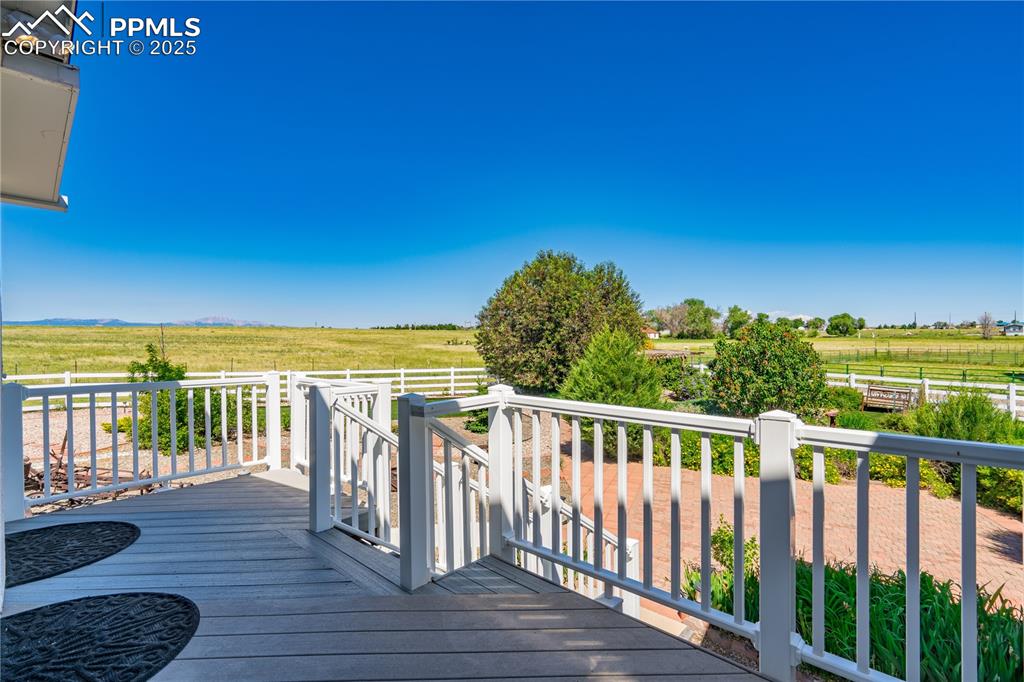 Image 24 of 45: Deck featuring a rural view
