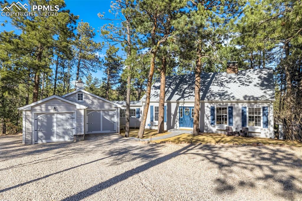 Image 2 of 50: Stunning Cape Cod style home set on a picturesque 1.91 acre lot in Academy 