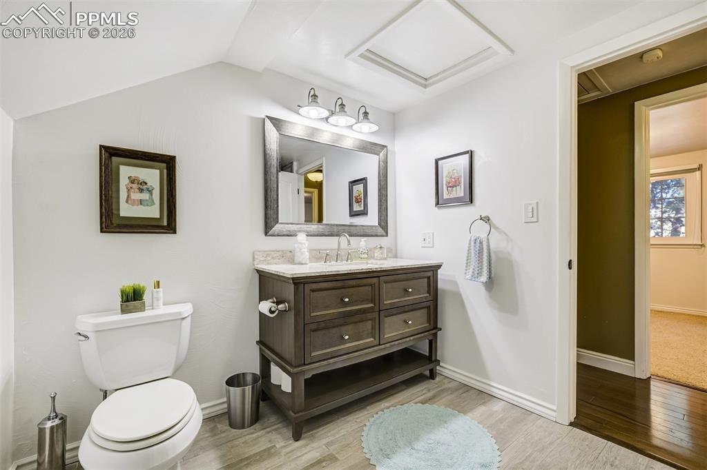Image 28 of 50: Updated upstairs bathroom with tub shower combination