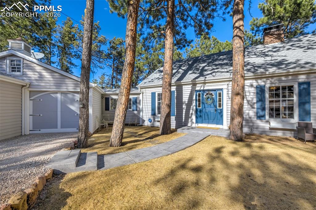 Image 3 of 50: Stunning Cape Cod style home set on a picturesque 1.91 acre lot in Academy 