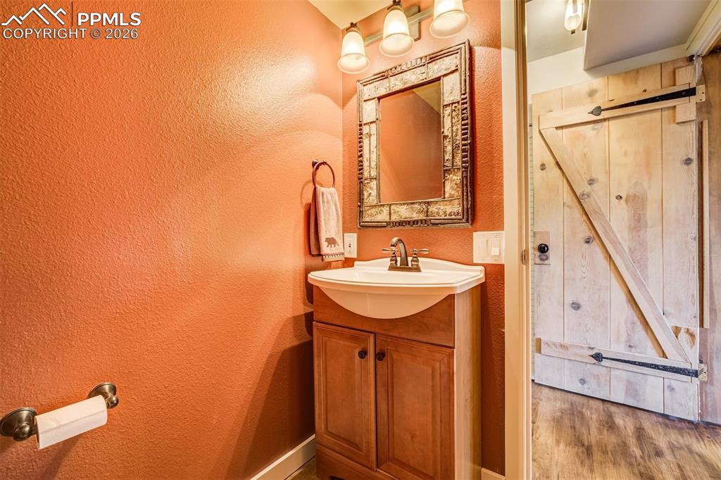 Image 35 of 50: Half bath in basement