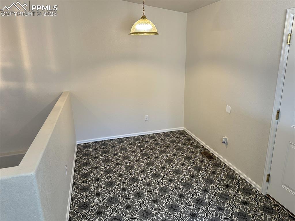 Image 10 of 50: Eat in dining area with new vinyl flooring