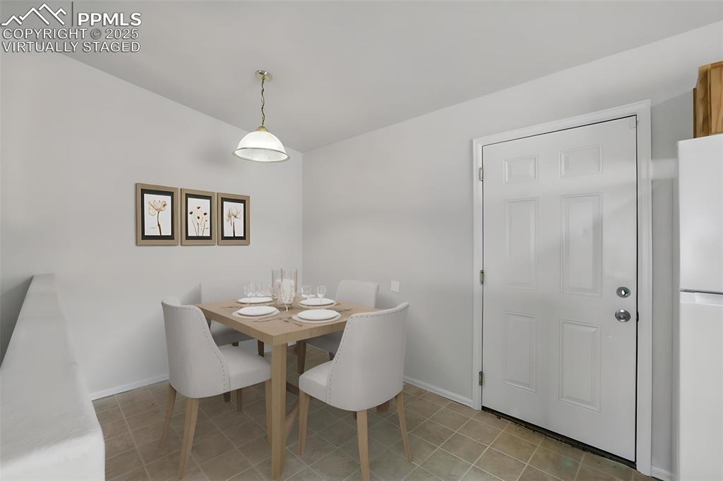 Image 12 of 50: "Virtually Staged" Eat In Dining Area