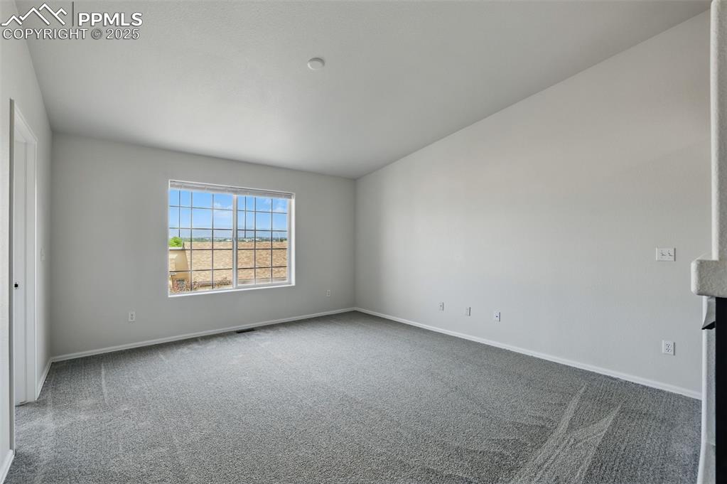 Image 18 of 50: Formal Living room with amazing mountain views