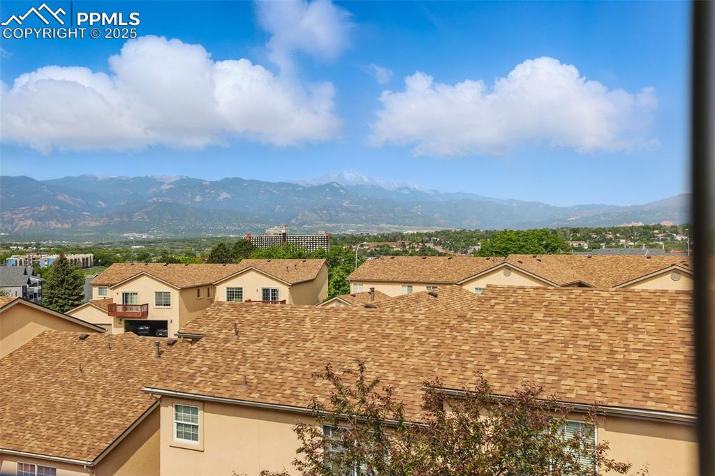 Image 24 of 50: Mountain view with nearby suburban area