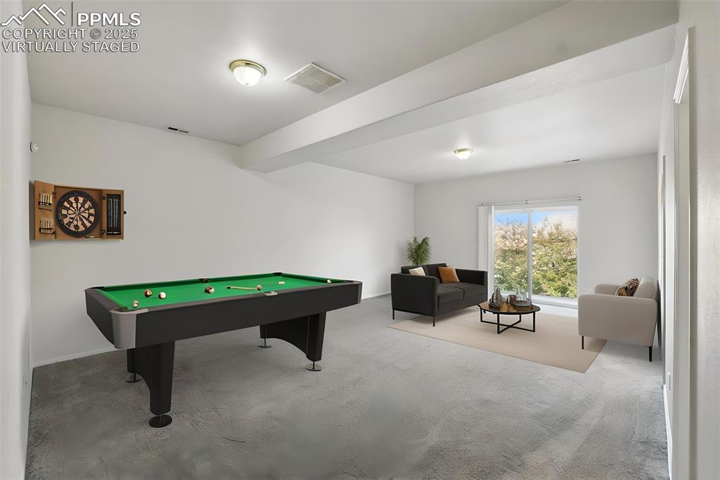 Image 37 of 50: "Virtually Staged" Family Room