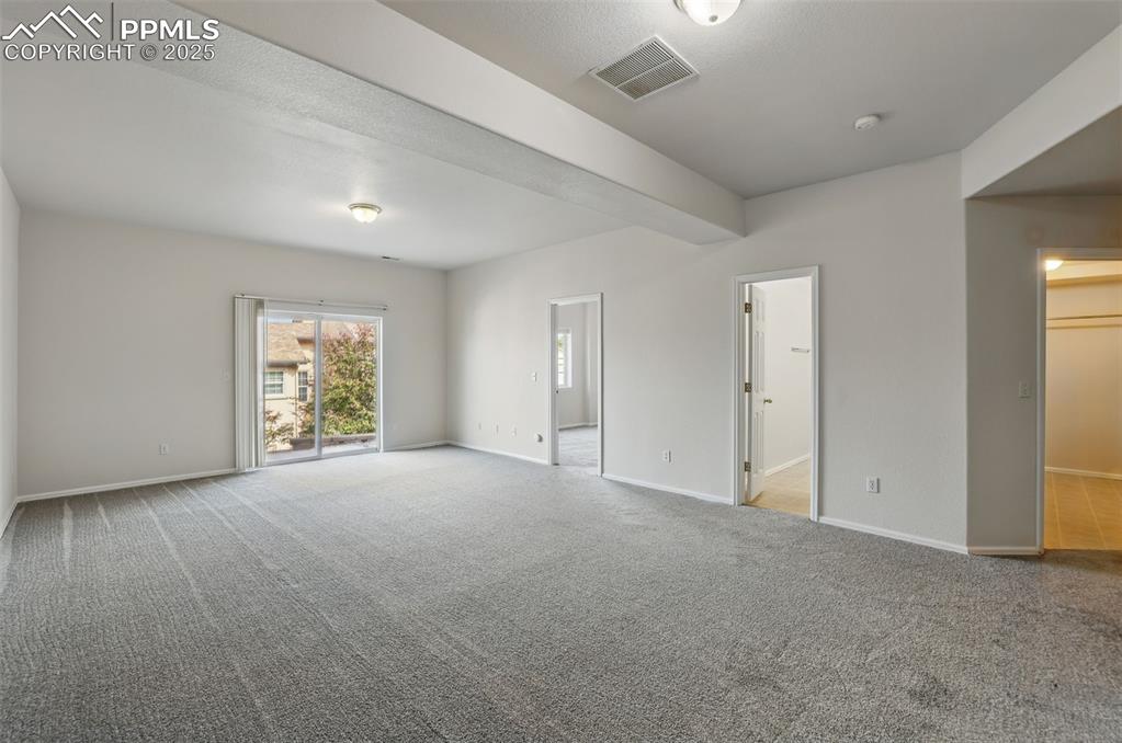 Image 38 of 50: Basement family room with walk out