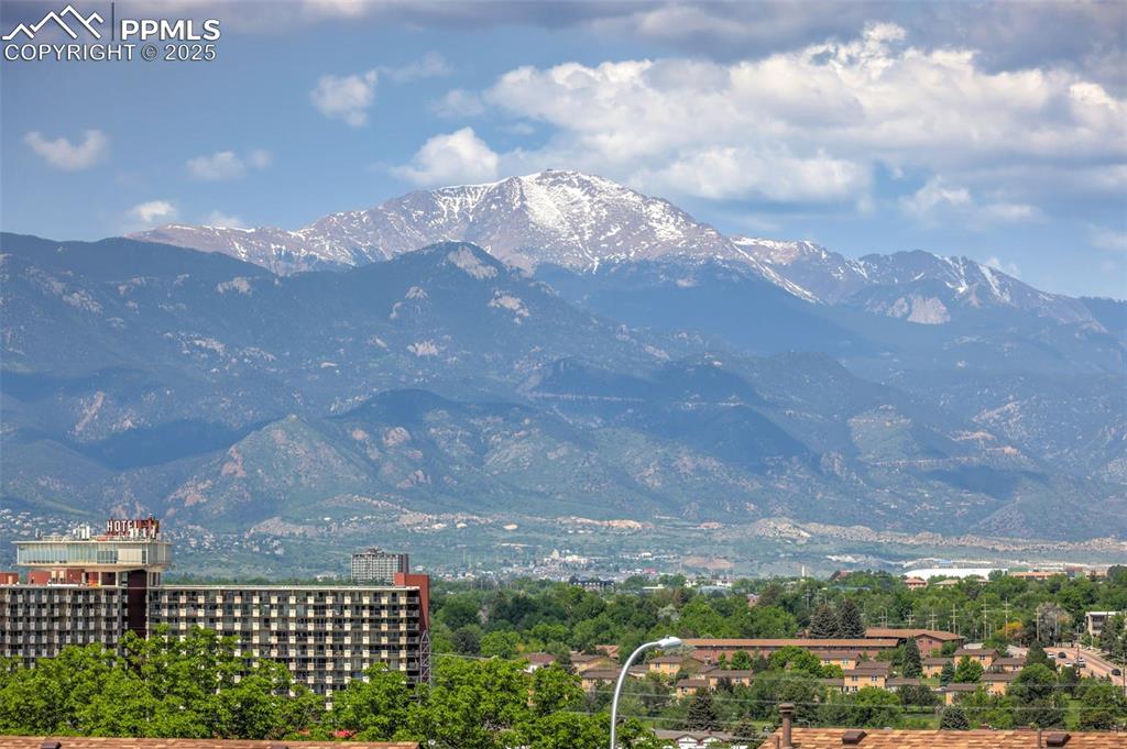 Image 48 of 50: View of mountain backdrop including Pikes Peak