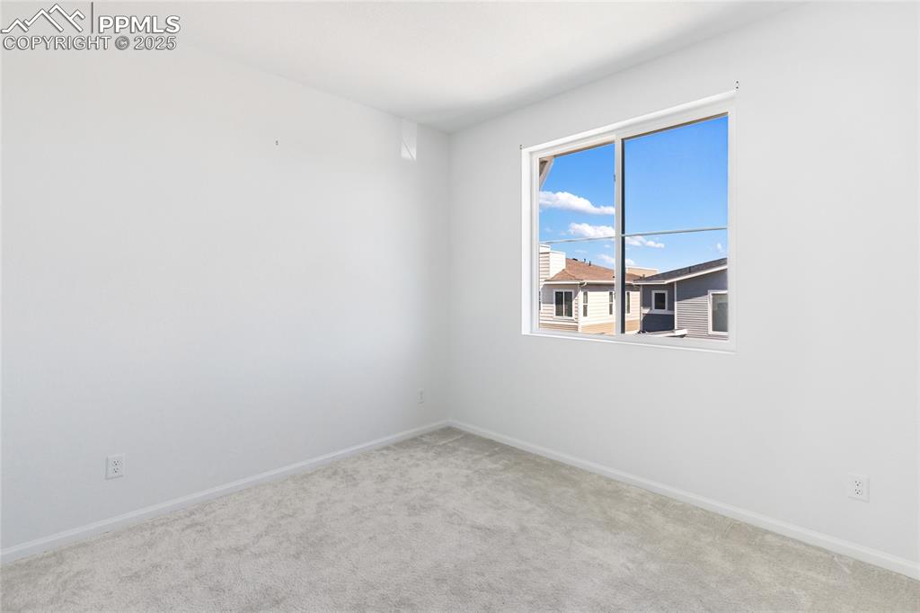 Image 17 of 37: One of 3 bedrooms on the upper level