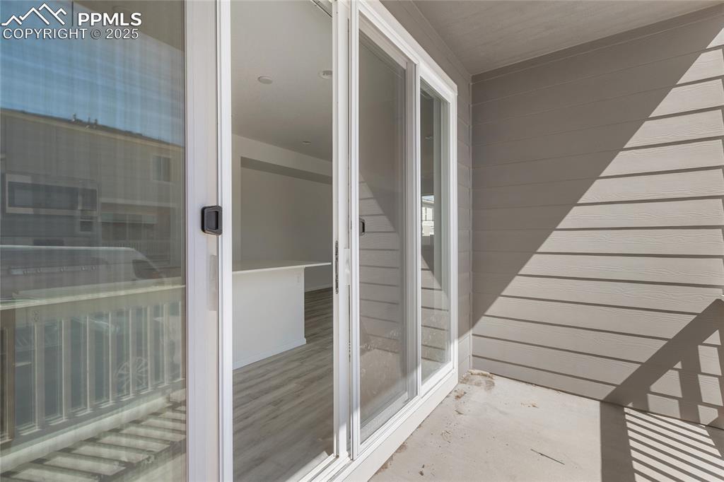 Image 32 of 37: Covered patio that walks out from the kitchen/dining area