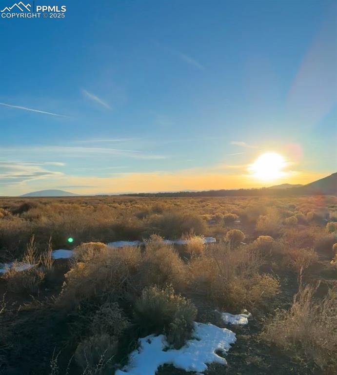 Image 4 of 14: Nature at dusk featuring a mountain view
