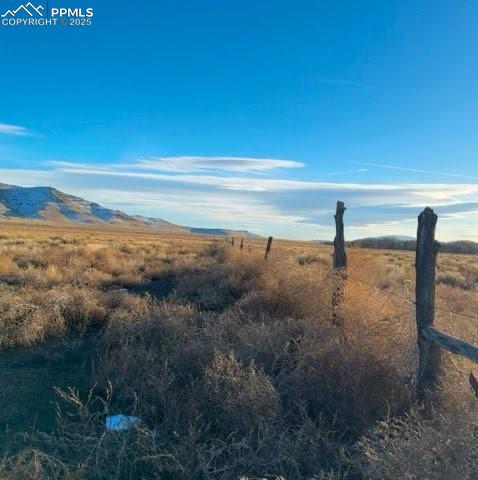 Image 9 of 14: Property view of mountains with a rural view