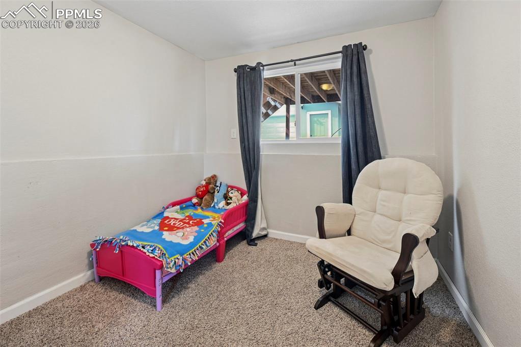 Image 17 of 38: Bedroom