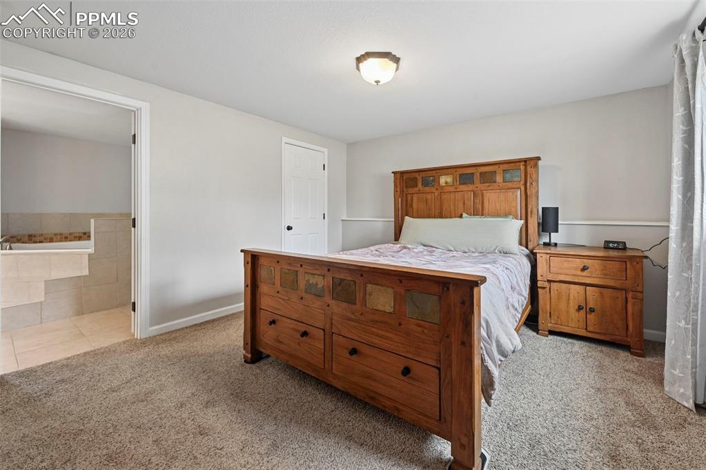 Image 19 of 38: Master Bedroom