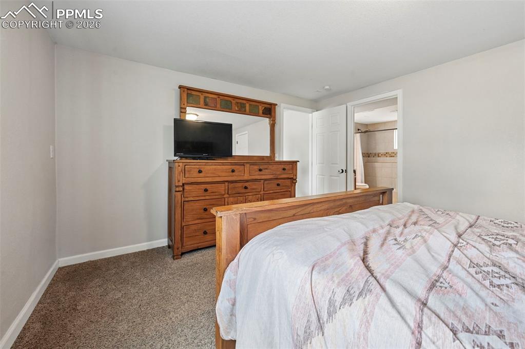 Image 20 of 38: Master Bedroom