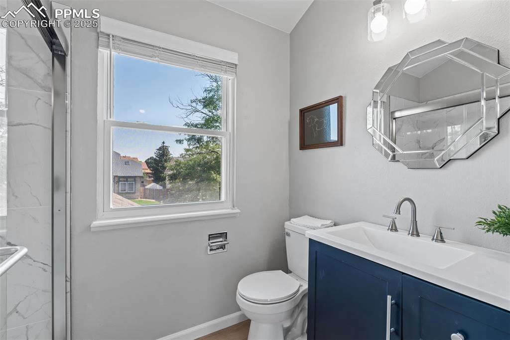 Image 22 of 40: Bathroom featuring vanity and toilet