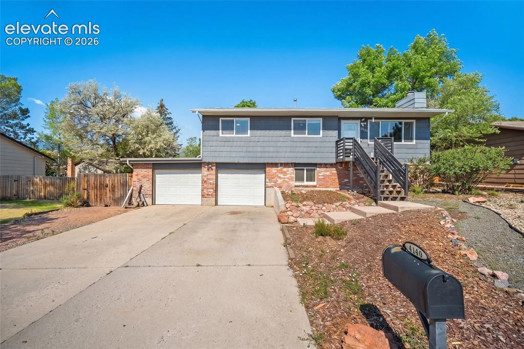Image 1 of 50: Front exterior of home with two-car garage