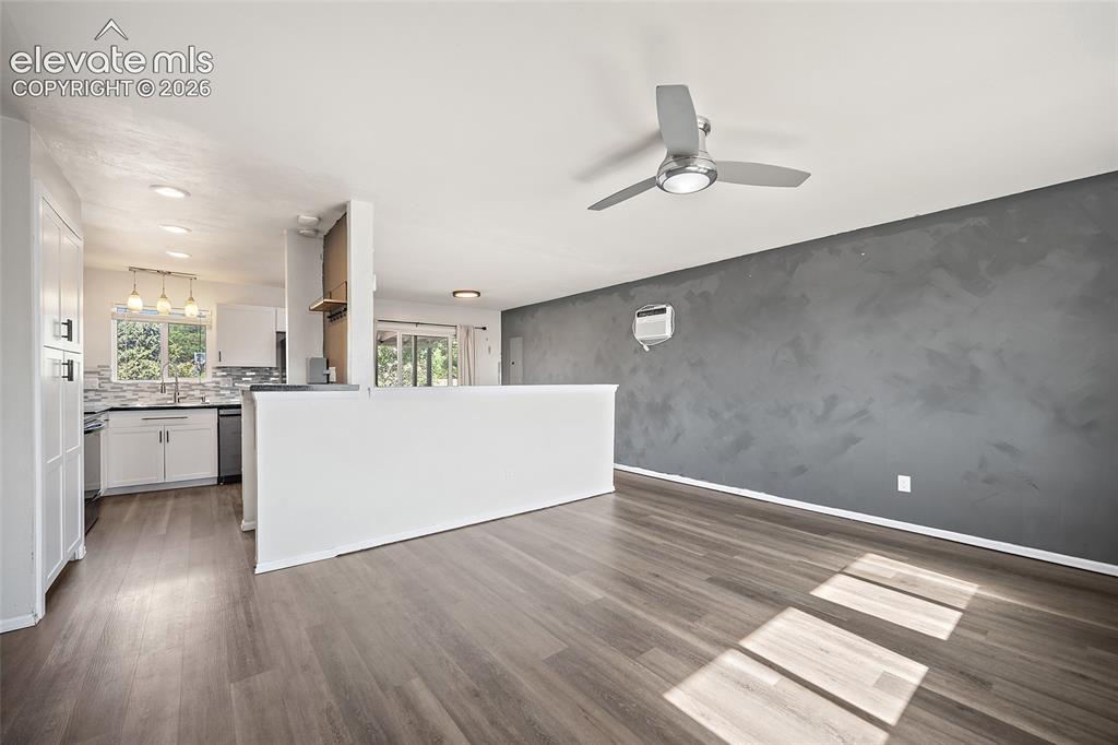 Image 5 of 50: Living room with open floor plan.