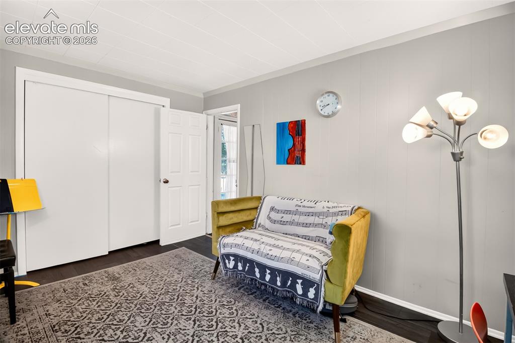 Image 12 of 30: Main level bedroom 