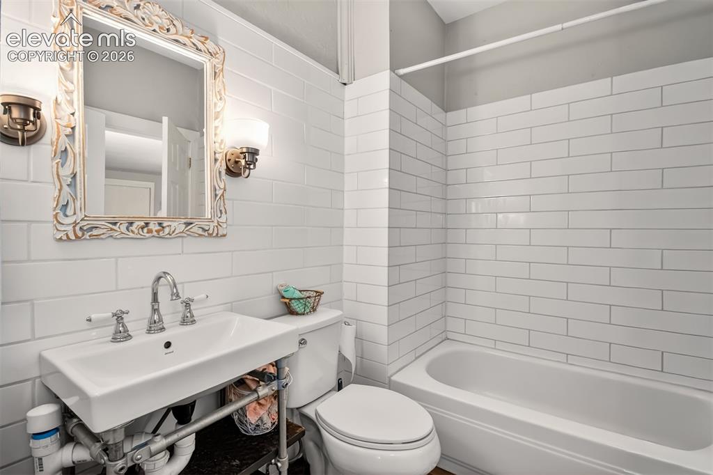 Image 13 of 30: Main level bathroom