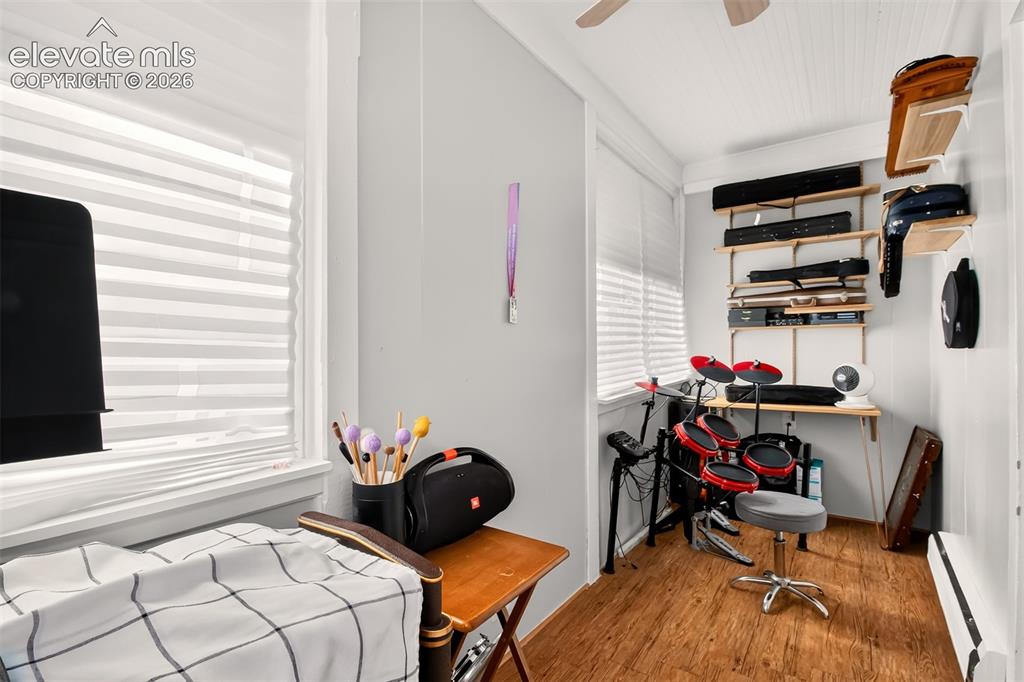 Image 14 of 30: Located off the dining room, this bonus room is perfect for an office or ho