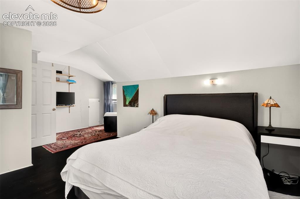 Image 17 of 30: Primary bedroom and sitting room